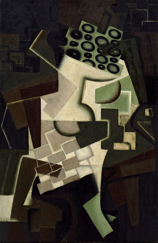 Plat à fruits sur une nappe à carreaux – Juan Gris Juan Gris